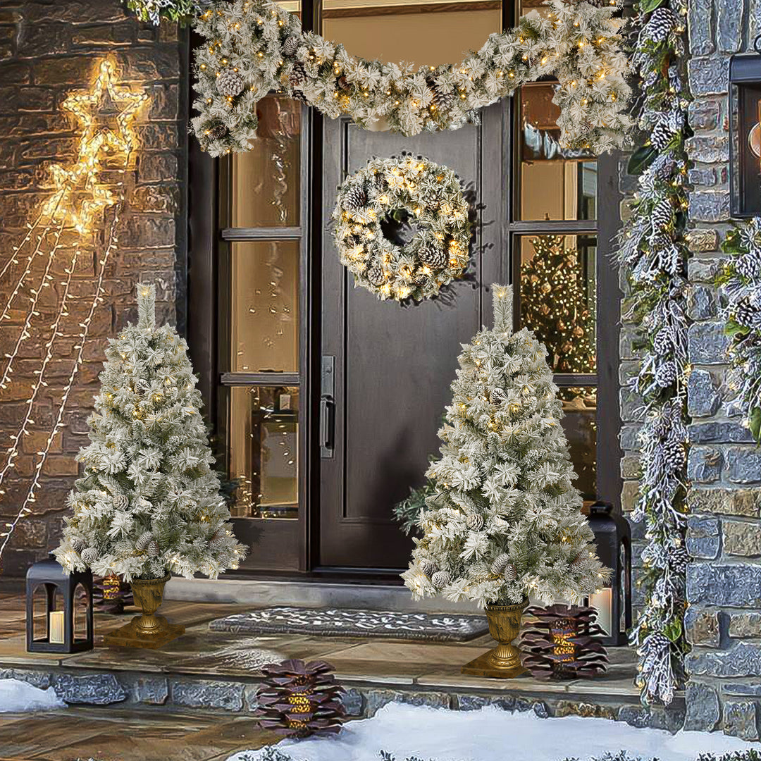 A set of 4 artificial Christmas trees, including flower garlands, flower garlands, and 2 entrance trees, with LED lights